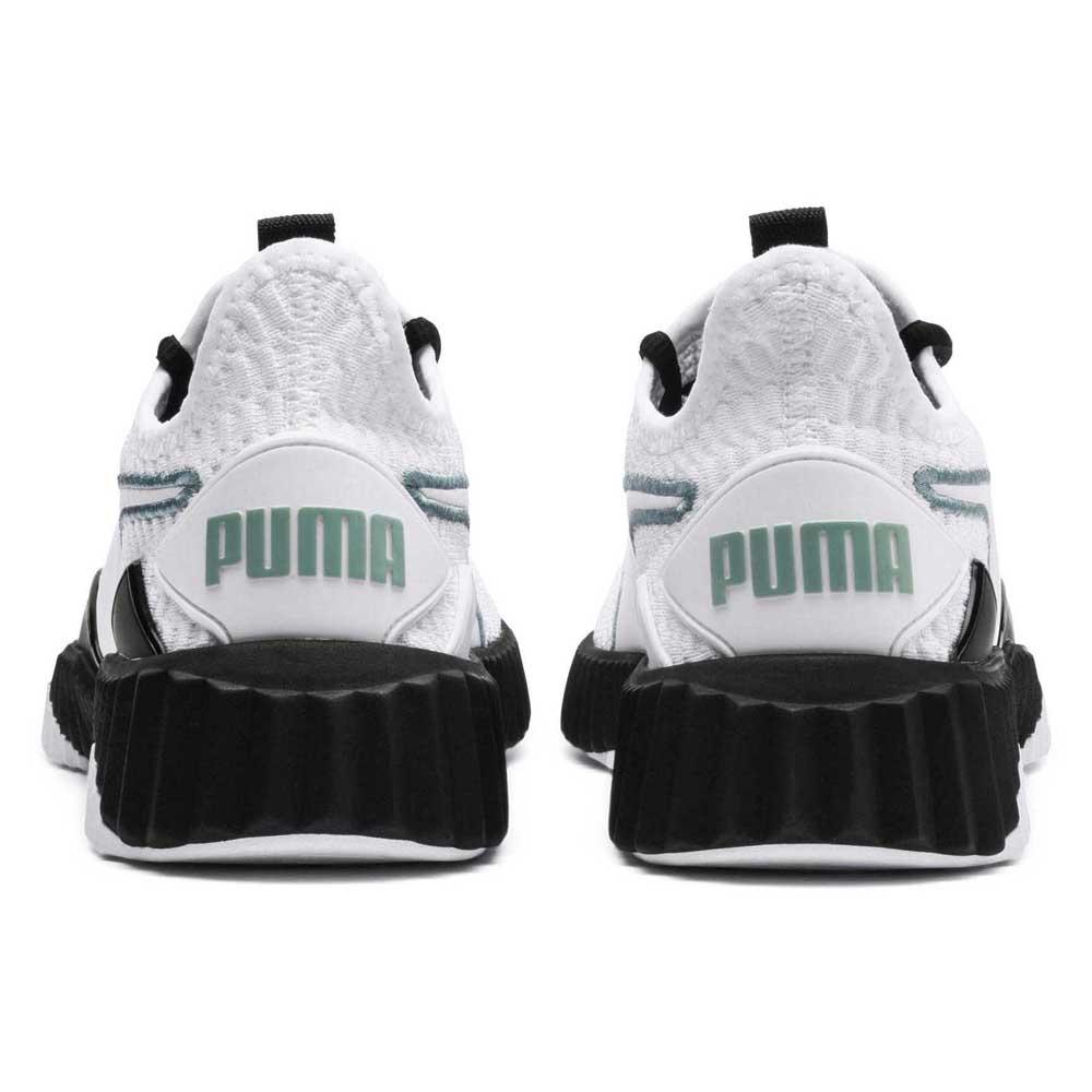 puma defy trainers white
